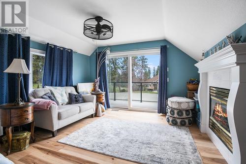 4172 Gallaghers Grove, Kelowna, BC - Indoor Photo Showing Living Room With Fireplace