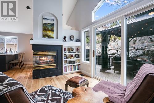 4172 Gallaghers Grove, Kelowna, BC - Indoor Photo Showing Living Room With Fireplace