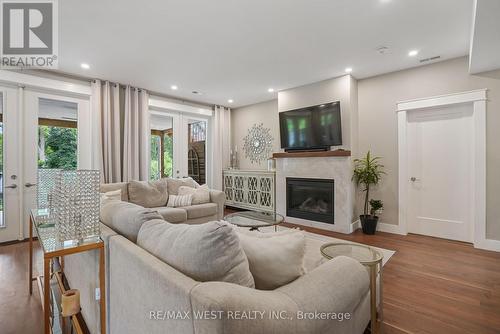 115 Clapperton Street, Barrie, ON - Indoor Photo Showing Living Room With Fireplace