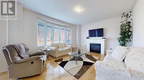 288 Elbern Markell Drive, Brampton, ON - Indoor Photo Showing Living Room With Fireplace