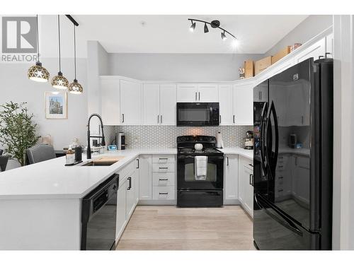 2611 Stillwater Way Unit# 112, Lake Country, BC - Indoor Photo Showing Kitchen With Upgraded Kitchen