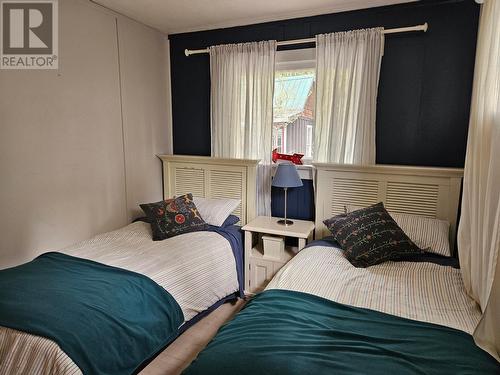 209 1St Avenue, Nakusp, BC - Indoor Photo Showing Bedroom