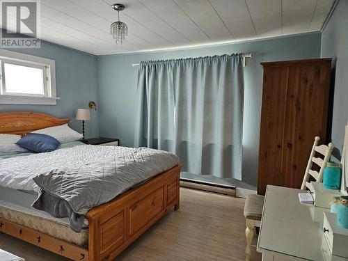 209 1St Avenue, Nakusp, BC - Indoor Photo Showing Bedroom