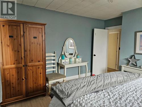 209 1St Avenue, Nakusp, BC - Indoor Photo Showing Bedroom