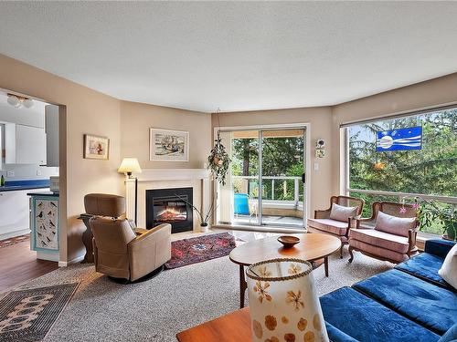 3190-2600 Ferguson Rd, Central Saanich, BC - Indoor Photo Showing Living Room With Fireplace