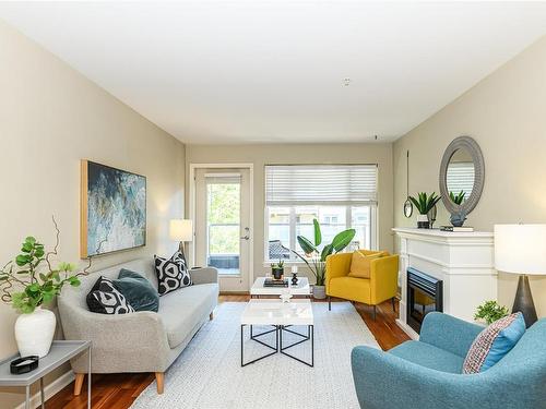 206-1510 Hillside Ave, Victoria, BC - Indoor Photo Showing Living Room With Fireplace