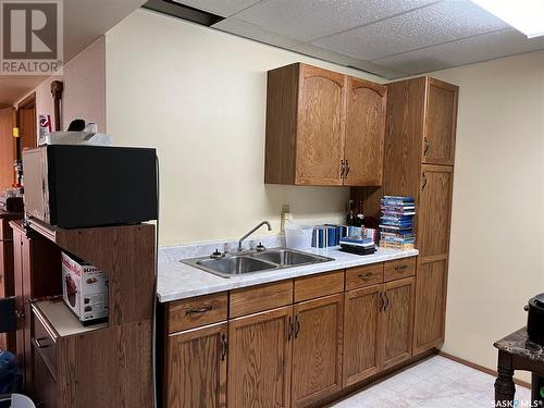 30 Marion Crescent, Meadow Lake, SK - Indoor Photo Showing Kitchen With Double Sink