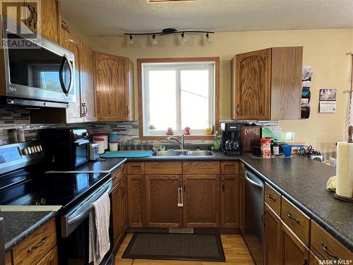 30 Marion Crescent, Meadow Lake, SK - Indoor Photo Showing Kitchen With Double Sink