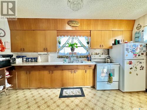 85 First Avenue N, Yorkton, SK - Indoor Photo Showing Kitchen With Double Sink