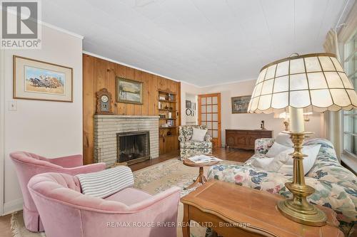 B - 5250 County Rd 45 Road, Hamilton Township (Baltimore), ON - Indoor Photo Showing Living Room With Fireplace