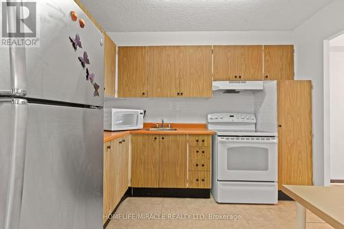 806 - 4091 Sheppard Avenue E, Toronto (Agincourt South-Malvern West), ON - Indoor Photo Showing Kitchen