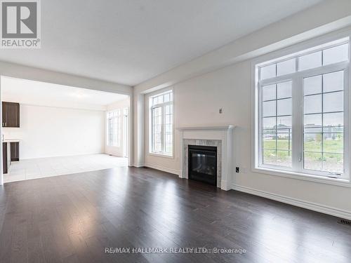 2134 Speare Court E, Innisfil, ON - Indoor Photo Showing Living Room With Fireplace