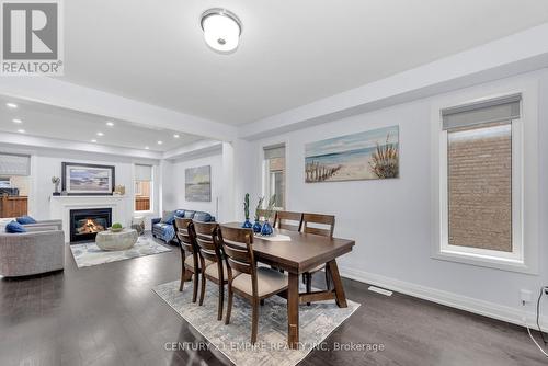 4128 Hillsborough Crescent, Oakville, ON - Indoor Photo Showing Dining Room With Fireplace