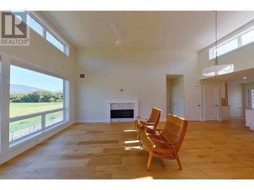 121 Harbourfront Drive Ne Unit# 10, Salmon Arm, BC - Indoor Photo Showing Other Room With Fireplace