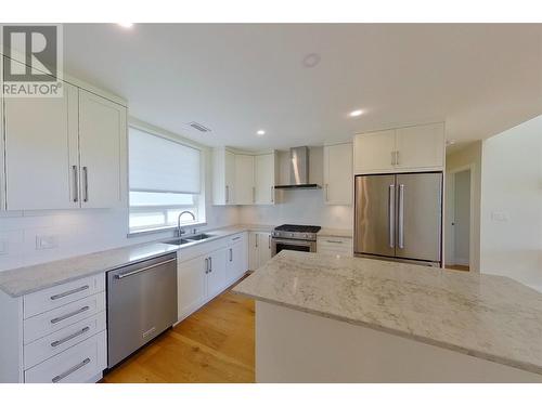 121 Harbourfront Drive Ne Unit# 10, Salmon Arm, BC - Indoor Photo Showing Kitchen With Double Sink