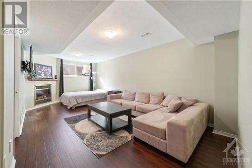 2228 Brockstone Crescent, Ottawa, ON - Indoor Photo Showing Living Room With Fireplace