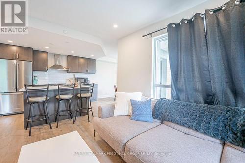 306 - 58 Lakeside Terrace, Barrie (Little Lake), ON - Indoor Photo Showing Kitchen With Stainless Steel Kitchen