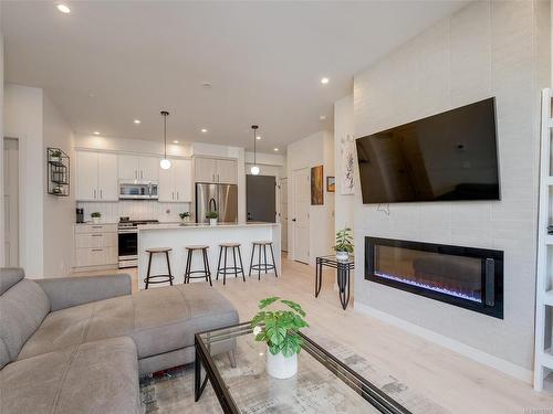 406-958 Pharoah Mews, Langford, BC - Indoor Photo Showing Living Room With Fireplace