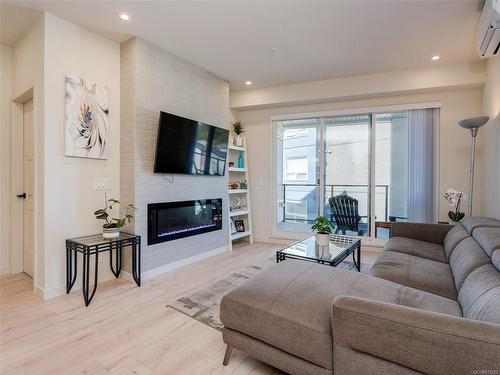 406-958 Pharoah Mews, Langford, BC - Indoor Photo Showing Living Room With Fireplace