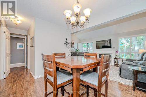 2099 Chrisdon Road, Burlington, ON - Indoor Photo Showing Dining Room With Fireplace