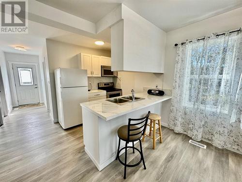 5013 52 Avenue, Pouce Coupe, BC - Indoor Photo Showing Kitchen With Double Sink