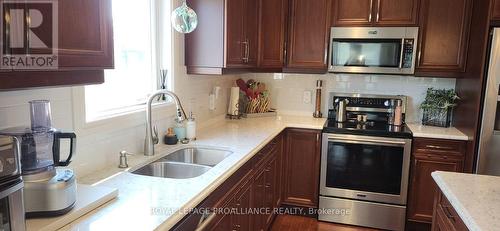 12 Dorchester Drive, Prince Edward County (Wellington), ON - Indoor Photo Showing Kitchen With Stainless Steel Kitchen With Double Sink