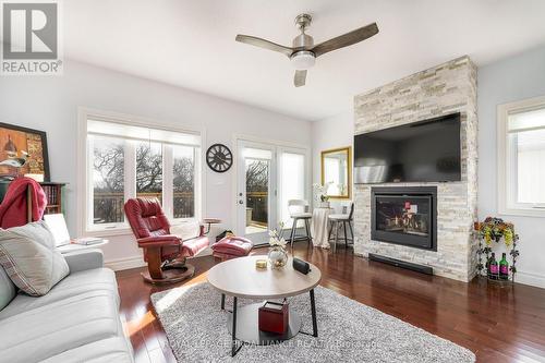 12 Dorchester Drive, Prince Edward County (Wellington), ON - Indoor Photo Showing Living Room With Fireplace