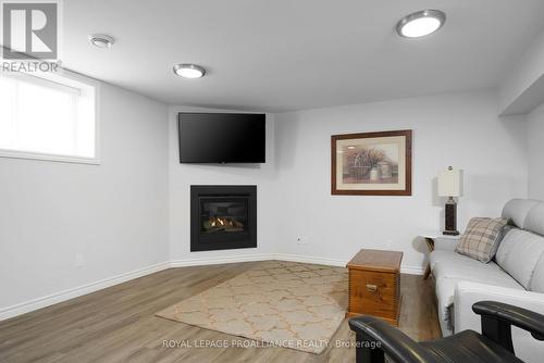 12 Dorchester Drive, Prince Edward County (Wellington), ON - Indoor Photo Showing Living Room With Fireplace