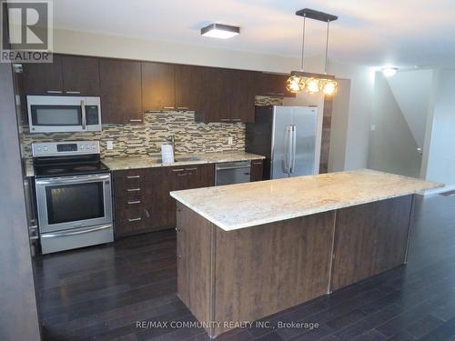 4 - 91 Coughlin Road, Barrie (Holly), ON - Indoor Photo Showing Kitchen With Upgraded Kitchen