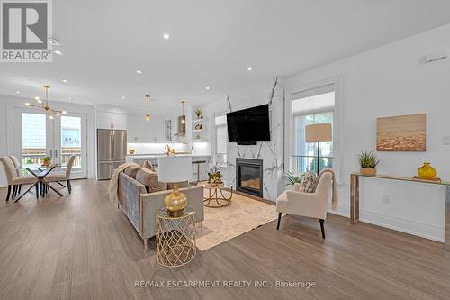 1 - 2134 New Street, Burlington (Brant), ON - Indoor Photo Showing Living Room With Fireplace