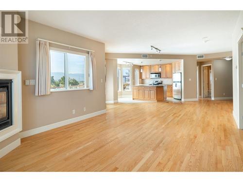 1947 Underhill Street Unit# 403, Kelowna, BC - Indoor Photo Showing Living Room With Fireplace