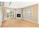 1947 Underhill Street Unit# 403, Kelowna, BC  - Indoor Photo Showing Living Room With Fireplace 