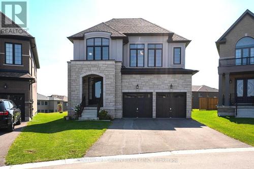 125 Prince Charles Crescent, Woodstock, ON - Outdoor With Facade