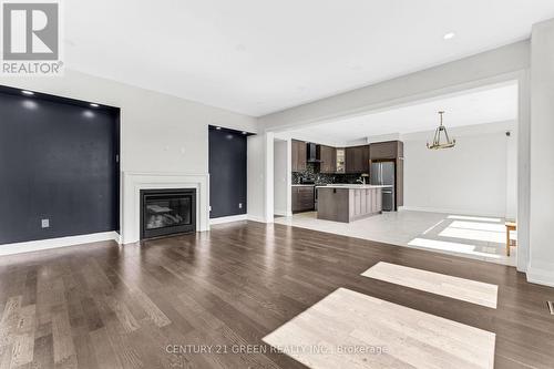 125 Prince Charles Crescent, Woodstock, ON - Indoor Photo Showing Living Room With Fireplace