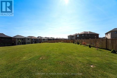 125 Prince Charles Crescent, Woodstock, ON - Outdoor With Backyard