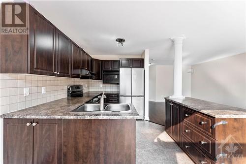 608 Glastonbury Walk, Ottawa, ON - Indoor Photo Showing Kitchen With Stainless Steel Kitchen With Double Sink