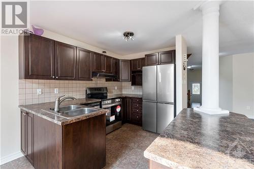 608 Glastonbury Walk, Ottawa, ON - Indoor Photo Showing Kitchen With Stainless Steel Kitchen With Double Sink