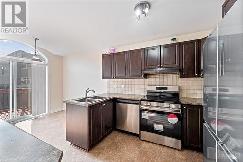 608 Glastonbury Walk, Ottawa, ON - Indoor Photo Showing Kitchen With Double Sink