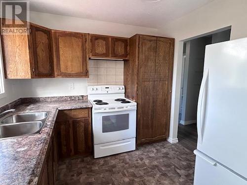 75 Chowsunket Street, Fraser Lake, BC - Indoor Photo Showing Kitchen With Double Sink