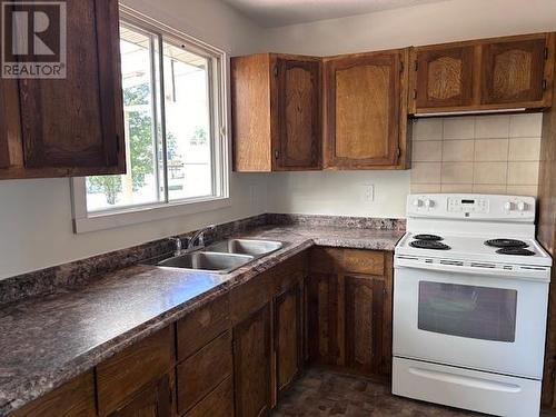 75 Chowsunket Street, Fraser Lake, BC - Indoor Photo Showing Kitchen With Double Sink