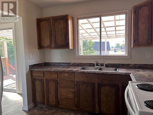 75 Chowsunket Street, Fraser Lake, BC - Indoor Photo Showing Kitchen With Double Sink