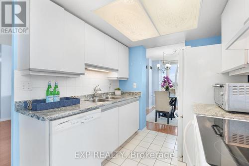 1407 - 30 Malta Avenue, Brampton (Fletcher'S Creek South), ON - Indoor Photo Showing Kitchen With Double Sink