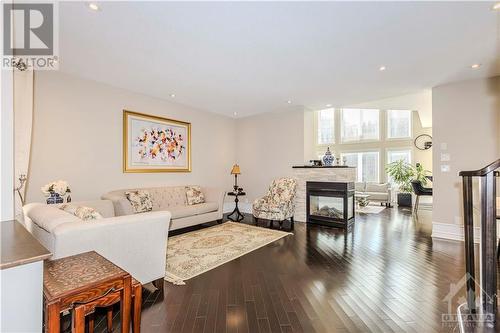 318 Laughlin Circle, Ottawa, ON - Indoor Photo Showing Living Room With Fireplace