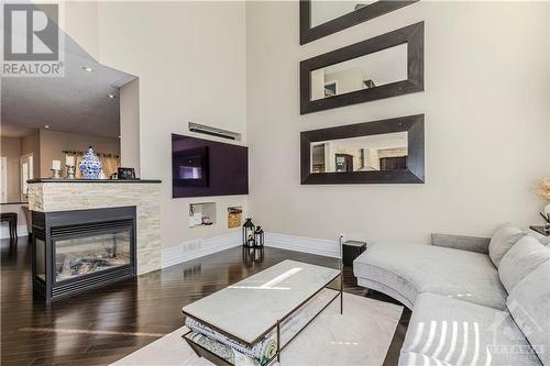 318 Laughlin Circle, Ottawa, ON - Indoor Photo Showing Living Room With Fireplace