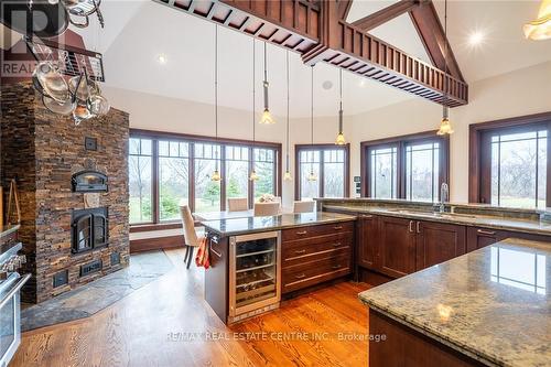 76 Oak Avenue, Hamilton (Dundas), ON - Indoor Photo Showing Kitchen With Fireplace With Double Sink