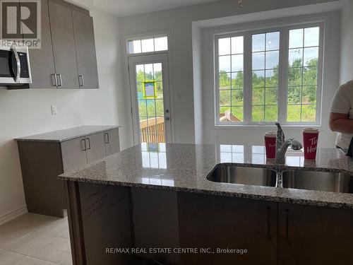 1583 Scarlett Trail, Pickering, ON - Indoor Photo Showing Kitchen With Double Sink