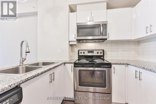 606 - 2900 Highway 7 Road, Vaughan, ON - Indoor Photo Showing Kitchen With Stainless Steel Kitchen With Double Sink With Upgraded Kitchen