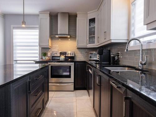 Kitchen - 12515  - 12517 60E Avenue (R.-D.-P.), Montréal (Rivière-Des-Prairies/Pointe-Aux-Trembles), QC - Indoor Photo Showing Kitchen With Upgraded Kitchen