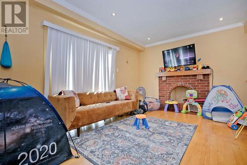 100 Nettlecreek Crescent, Toronto (Milliken), ON - Indoor Photo Showing Living Room With Fireplace