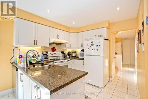 100 Nettlecreek Crescent, Toronto (Milliken), ON - Indoor Photo Showing Kitchen With Double Sink